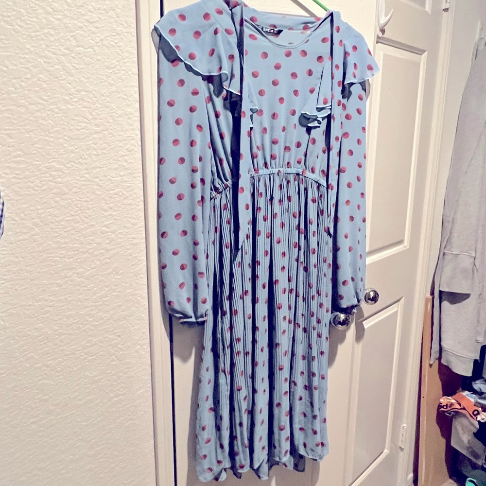 Blue polka dot midi dress to channel your 50’s secretary.